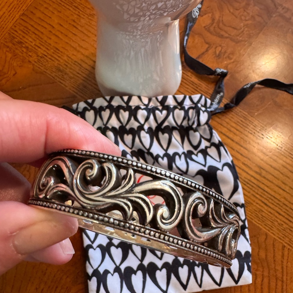 Silver Brighton hinged bangle with scrollwork pattern